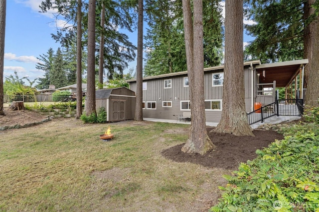 18568 Densmore Ave N, Shoreline, WA 98133 - rear view of property featuring a shed, board and batten siding, and a patio
