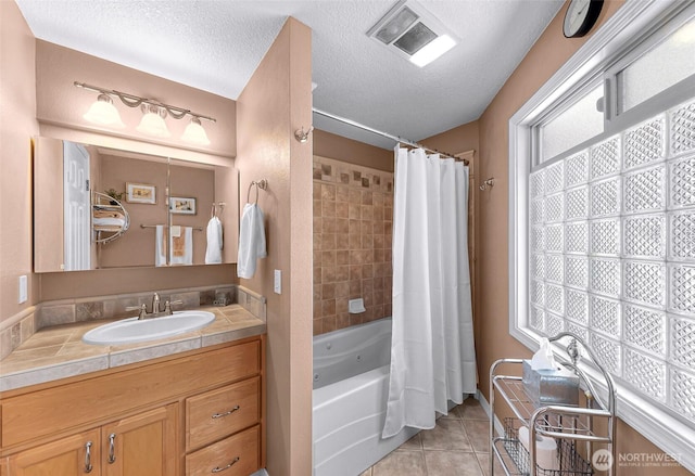 3026 E Alpine Dr, Bellingham, WA 98226 - bathroom with vanity, tile patterned flooring, shower / tub combo with curtain, and a textured ceiling