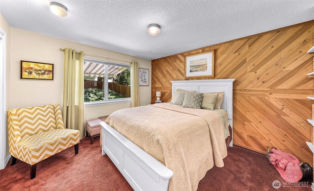 3026 E Alpine Dr, Bellingham, WA 98226 - bedroom with dark colored carpet, wood walls, and a textured ceiling