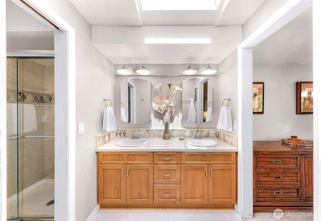 3026 E Alpine Dr, Bellingham, WA 98226 - full bath featuring double vanity, a stall shower, and tile patterned flooring