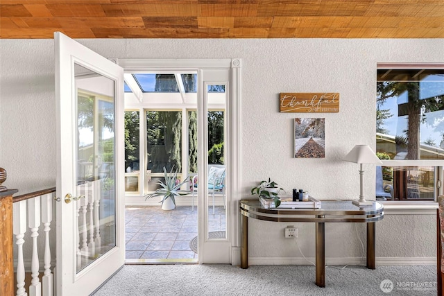 3026 E Alpine Dr, Bellingham, WA 98226 - doorway featuring a textured wall, wood ceiling, french doors, and carpet floors