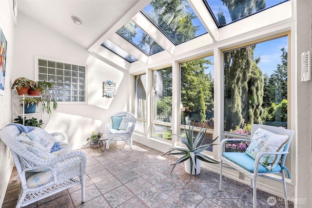 3026 E Alpine Dr, Bellingham, WA 98226 - sunroom featuring stone tile flooring, a skylight, and lofted ceiling