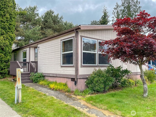 31600 126th Ave SE Unit 129, Auburn, WA 98092 - view of side of home with a lawn