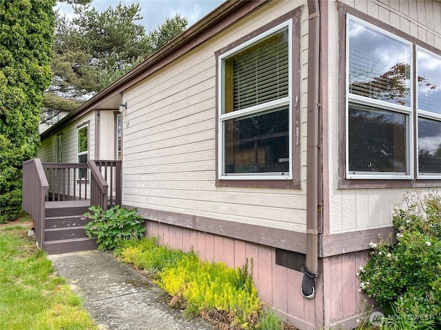 31600 126th Ave SE Unit 129, Auburn, WA 98092 - view of property exterior with a wooden deck