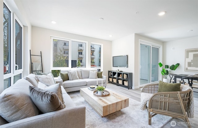 14598 Westminster Way N Unit 111, Shoreline, WA 98133 - living area featuring wood finished floors and recessed lighting