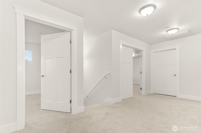 2403 79th Ave SE Unit 110, Tumwater, WA 98501 - unfurnished room with carpet flooring and baseboards
