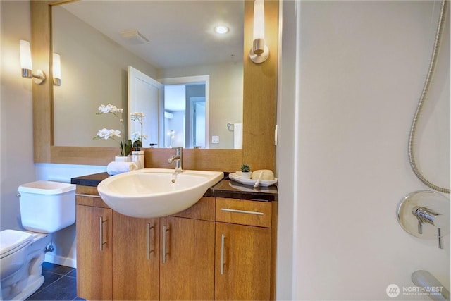 2721 1st Ave Unit Ph06, Seattle, WA 98121 - bathroom with vanity, toilet, a shower, and tile patterned flooring