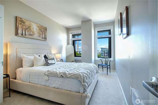 2721 1st Ave Unit Ph06, Seattle, WA 98121 - carpeted bedroom featuring baseboards