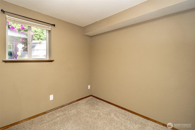 10908 151st St E, Puyallup, WA 98374 - carpeted spare room featuring baseboards