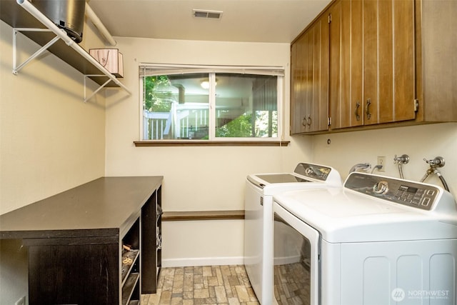 10908 151st St E, Puyallup, WA 98374 - laundry area featuring washer and clothes dryer and cabinet space