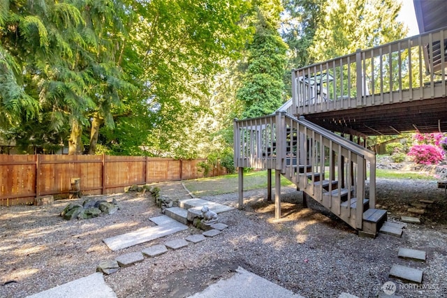 10908 151st St E, Puyallup, WA 98374 - view of yard with stairs and a wooden deck