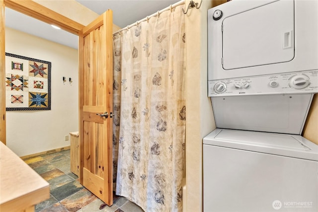 98 Homestead Rd, Winthrop, WA 98862 - laundry room with stacked washer / drying machine and stone finish flooring
