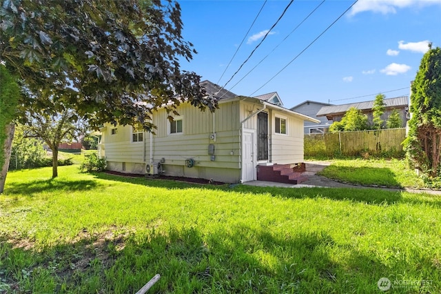 2526 S J St, Tacoma, WA 98405 - rear view of property with board and batten siding