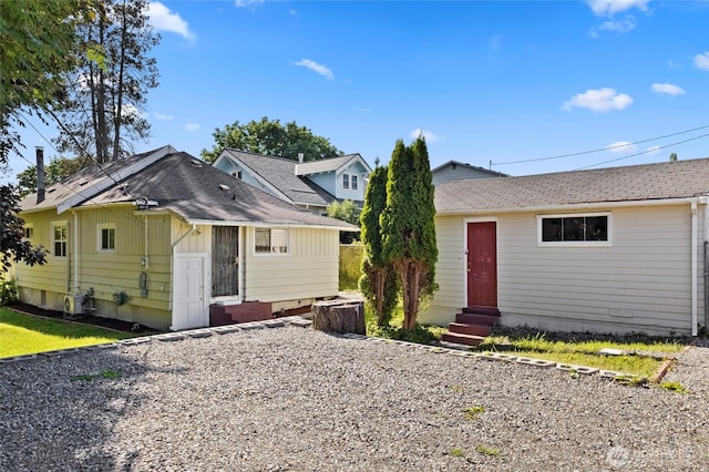 2526 S J St, Tacoma, WA 98405 - rear view of property with entry steps and roof with shingles