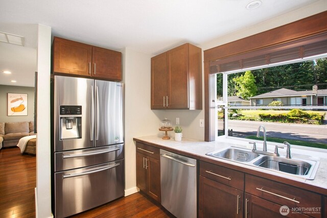 13632 SE Fairwood Blvd, Renton, WA 98058 - kitchen featuring stainless steel appliances, a sink, dark wood finished floors, light countertops, and recessed lighting