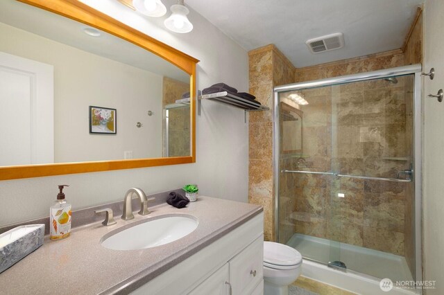 13632 SE Fairwood Blvd, Renton, WA 98058 - full bathroom with vanity, a shower stall, and toilet
