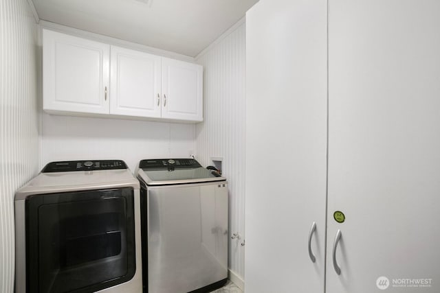13632 SE Fairwood Blvd, Renton, WA 98058 - laundry area featuring washing machine and dryer and cabinet space