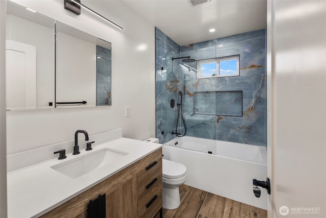 4821 S 364th St, Auburn, WA 98001 - full bath featuring toilet, wood finished floors, vanity, and shower / bathtub combination