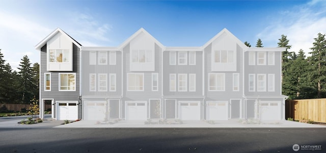 15726 40th Ave W Unit B1, Lynnwood, WA 98087 - view of property featuring an attached garage and driveway