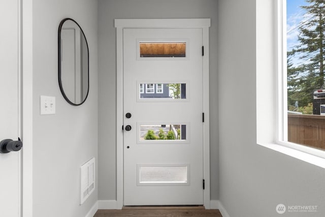 15726 40th Ave W Unit B1, Lynnwood, WA 98087 - doorway to outside with plenty of natural light, baseboards, and wood finished floors