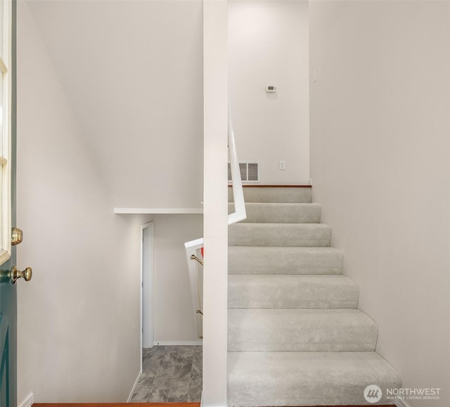 4460 249th Ter SE Unit 4-1, Sammamish, WA 98029 - staircase featuring baseboards