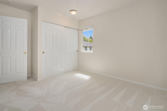 4460 249th Ter SE Unit 4-1, Sammamish, WA 98029 - unfurnished bedroom featuring carpet floors and baseboards