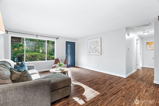 14520 78th Ave NE, Kenmore, WA 98028 - living room featuring baseboards and wood finished floors