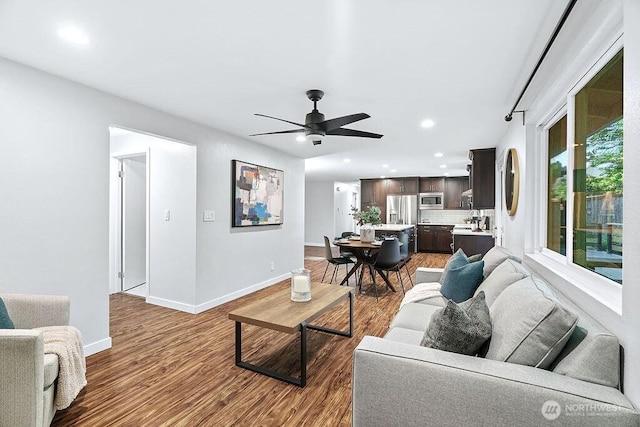 14520 78th Ave NE, Kenmore, WA 98028 - living room with recessed lighting, wood finished floors, baseboards, and ceiling fan