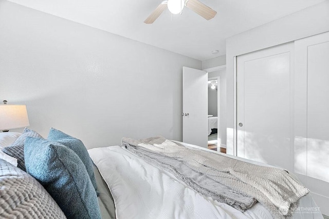 14520 78th Ave NE, Kenmore, WA 98028 - bedroom with a closet and a ceiling fan