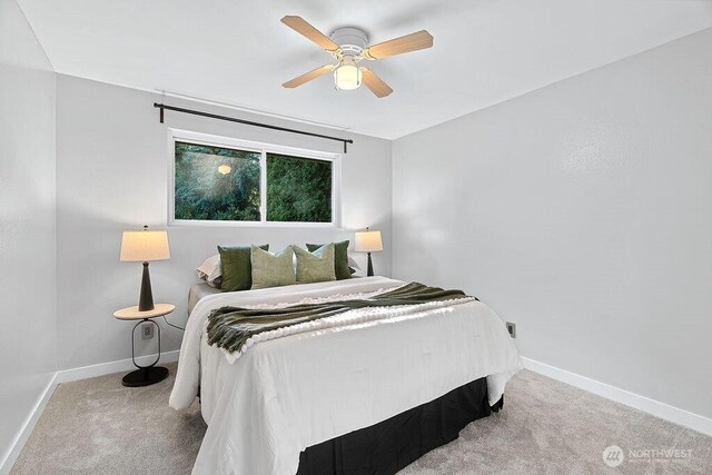 14520 78th Ave NE, Kenmore, WA 98028 - carpeted bedroom featuring baseboards and ceiling fan