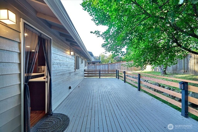 14520 78th Ave NE, Kenmore, WA 98028 - wooden terrace featuring a fenced backyard