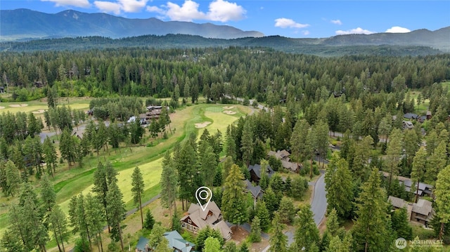 2101 Coal Mine Way, Cle Elum, WA 98922 - drone / aerial view of a mountain backdrop, a heavily wooded area, and a golf course