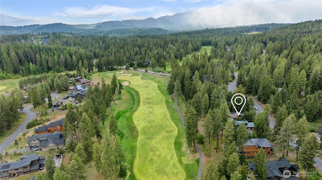 2101 Coal Mine Way, Cle Elum, WA 98922 - aerial view of residential area featuring a heavily wooded area, mountains, and a local golf course