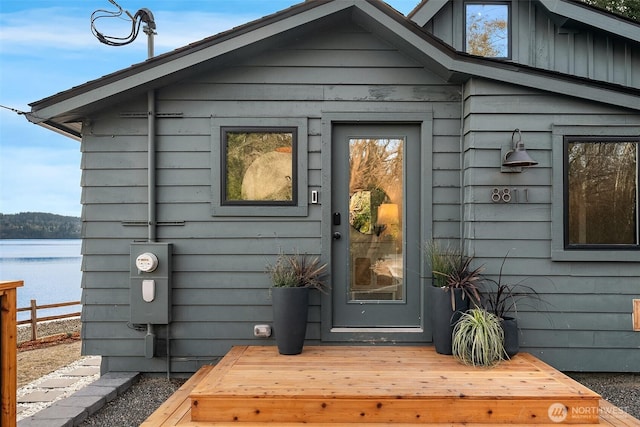8811 SW Quartermaster Dr, Vashon, WA 98070 - property entrance featuring board and batten siding and a water view