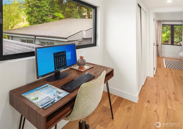 8811 SW Quartermaster Dr, Vashon, WA 98070 - home office with baseboards and wood finished floors