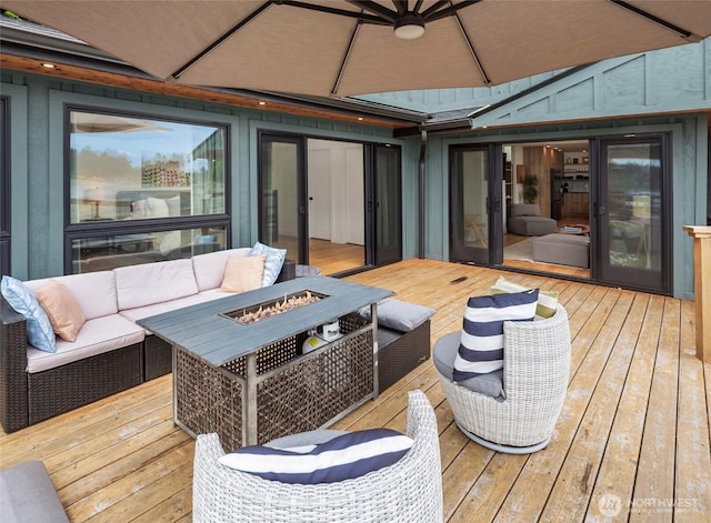 8811 SW Quartermaster Dr, Vashon, WA 98070 - wooden deck featuring an outdoor living space with a fire pit