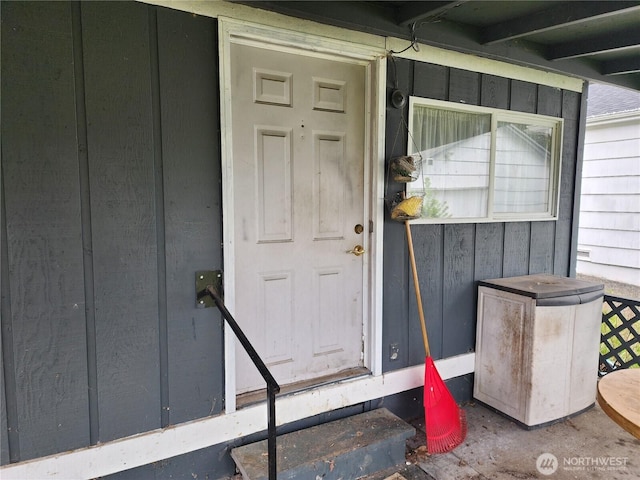 211 E Cherry St, Centralia, WA 98531 - view of exterior entry featuring board and batten siding