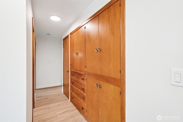 2228 Cinkovich St, Enumclaw, WA 98022 - hallway with light wood finished floors and baseboards