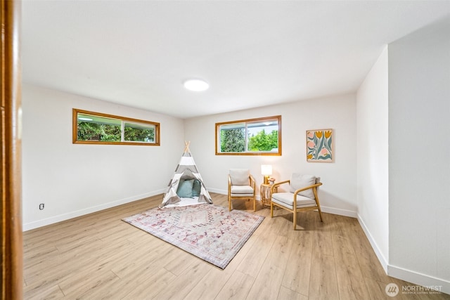 2228 Cinkovich St, Enumclaw, WA 98022 - sitting room with light wood-style floors and baseboards