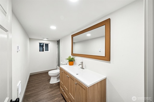 2228 Cinkovich St, Enumclaw, WA 98022 - bathroom featuring vanity, wood finished floors, and recessed lighting