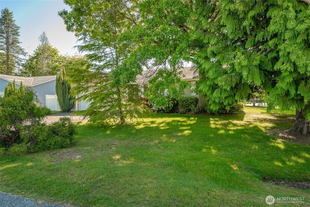 8459 Catalina Ct, Blaine, WA 98230 - view of green lawn featuring a garage