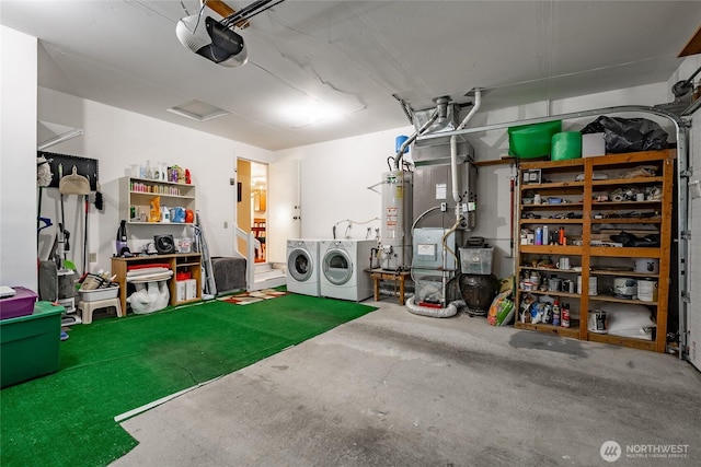 8459 Catalina Ct, Blaine, WA 98230 - garage featuring washing machine and clothes dryer, a garage door opener, water heater, and heating unit