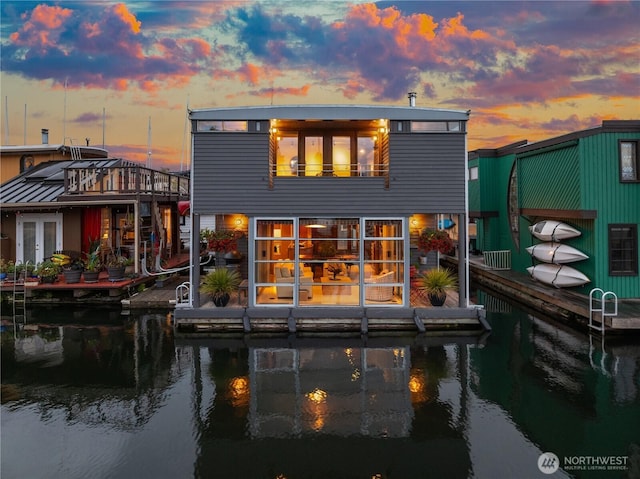 2466 Westlake Ave N Unit 5, Seattle, WA 98109 - back of house at dusk with a water view