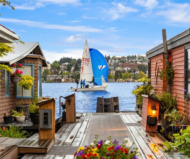 2466 Westlake Ave N Unit 5, Seattle, WA 98109 - view of patio with a water view and a boat dock