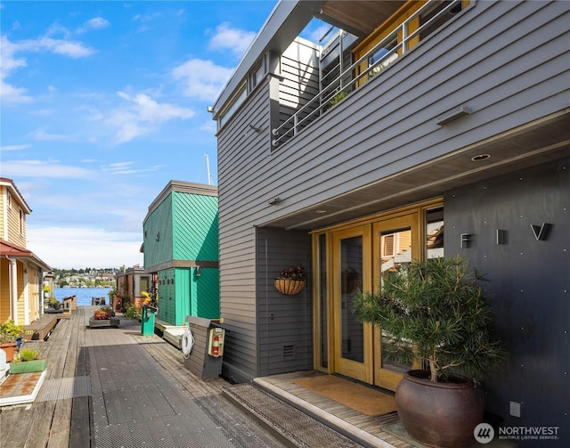 2466 Westlake Ave N Unit 5, Seattle, WA 98109 - wooden deck with french doors