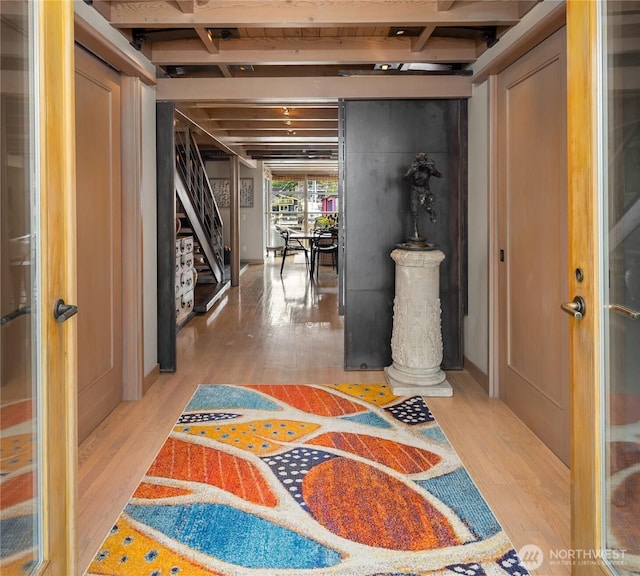 2466 Westlake Ave N Unit 5, Seattle, WA 98109 - foyer entrance with light wood-style floors and beam ceiling