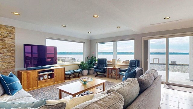 14028 Evergreen Way, Stanwood, WA 98292 - living area with a water view, recessed lighting, and light tile patterned floors