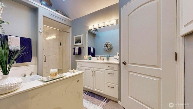 14028 Evergreen Way, Stanwood, WA 98292 - full bath featuring a marble finish shower, vanity, and tile patterned floors