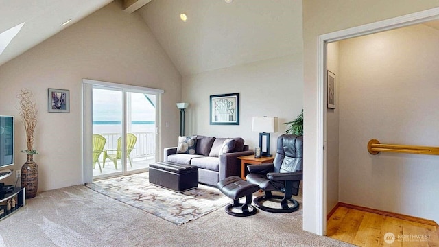 14028 Evergreen Way, Stanwood, WA 98292 - living room featuring beamed ceiling, high vaulted ceiling, and a skylight