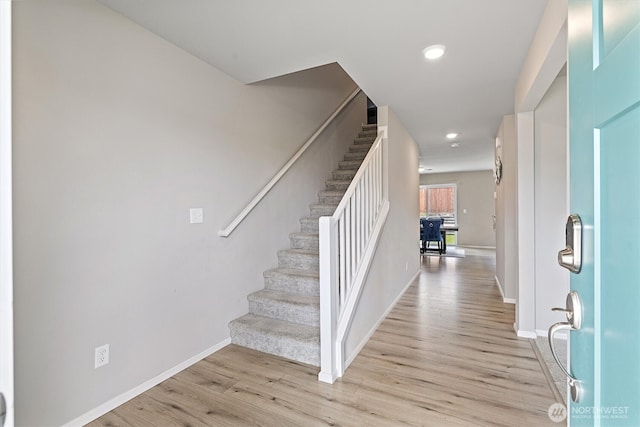 15013 Iverson Loop SE, Yelm, WA 98597 - entrance foyer featuring stairs, light wood-style flooring, baseboards, and recessed lighting